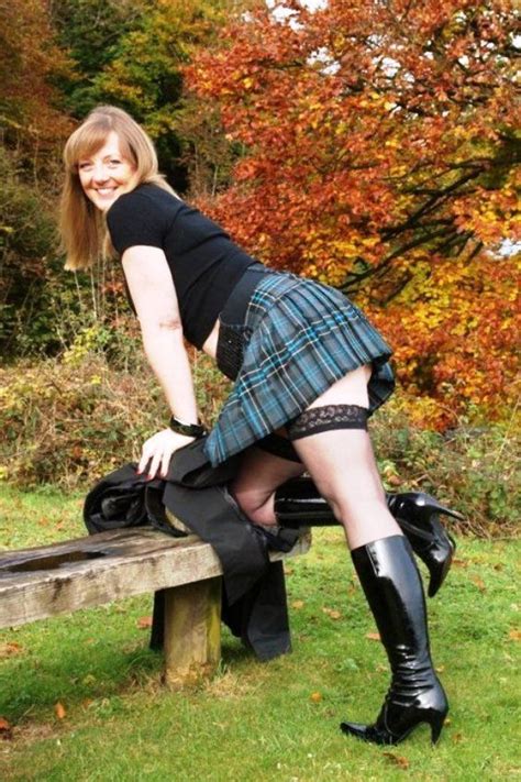 A Short Mini Skirt Stockings And Boots Just Boots And High Heels