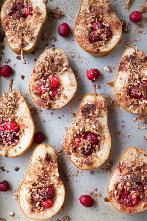 Looking for a healthier version of a classic christmas dessert recipe? Baked Pears with Honey, Cranberries and Pecans | This Gal ...