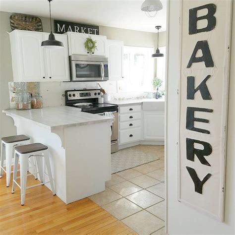Free delivery for many products! All signs point to gorgeous in this bright kitchen. With walls in Intellectual Gray SW 7045 ...