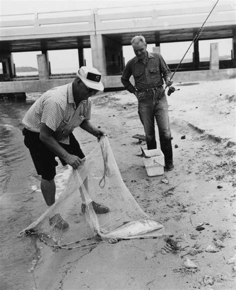 Florida Memory Fishermen With Redfish At Deer Point Lake In Panama
