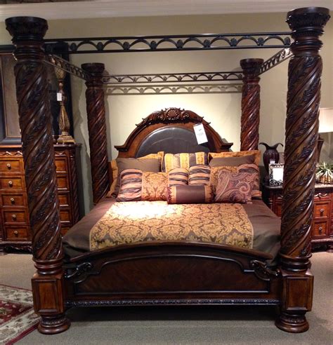 The opulent brown color flows. King canopy bed http://www.miskellys.com/ | Master ...