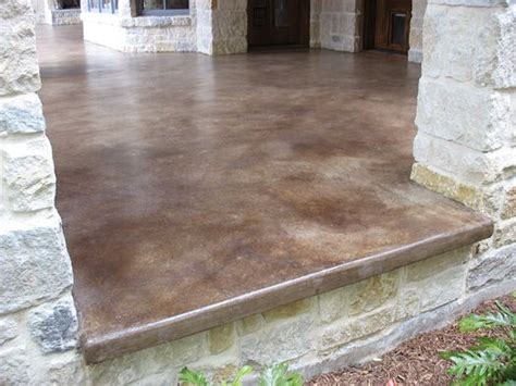 It likely had a wooden porch as part of the original configuration. Take a look at this patio concrete stain - Solcrete.com ...