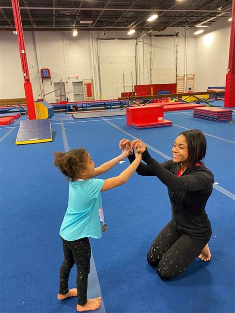 video former olympic star dominique dawes brings a new spirit to gymnastics the bay state banner