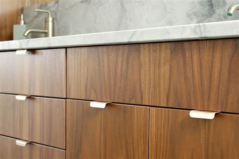 Subtle accents such as the drawer handles and pulls complement this formal kitchen's warm red walls and ceilings. Bathroom Reno Update: Mid-Century Modern Inspired ...