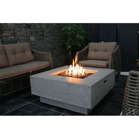A gas fire pit table is an outdoor patio table that provides heat through a burner and adjustable flame. Elementi Manhattan Concrete Propane/Natural Gas Fire Pit ...