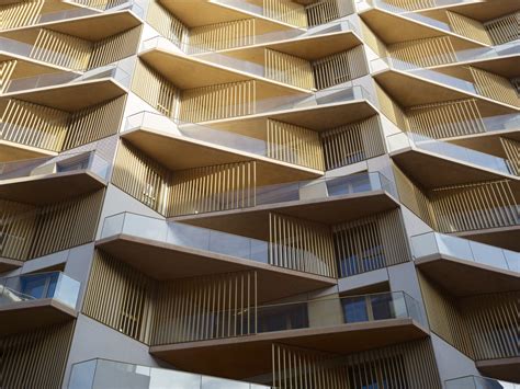 The Facade Of An Apartment Building With Balconies