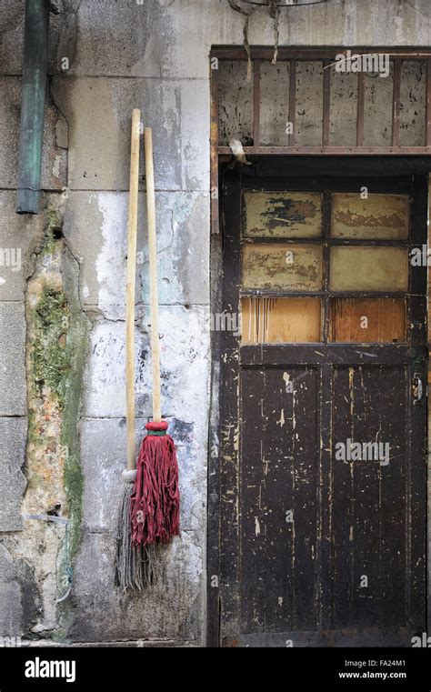 Typical Chinese Brooms Hanging At The Wall Of A House In Wuzhen China
