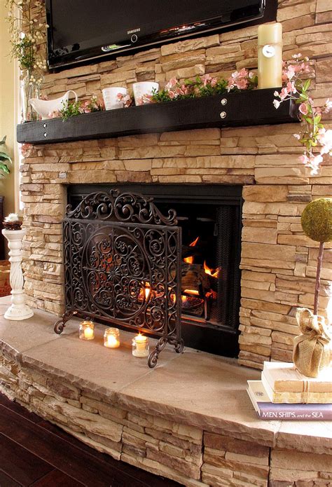 Traditional Light Beige Stacked Stone Fireplace Design With Candles And