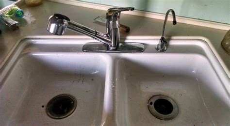 Mount the faucet on your sink, and tighten the hold down nuts using pliers or a basin wrench, being careful not to over tighten plastic nuts. How To Replace Your RV Kitchen Faucet (With Photos)