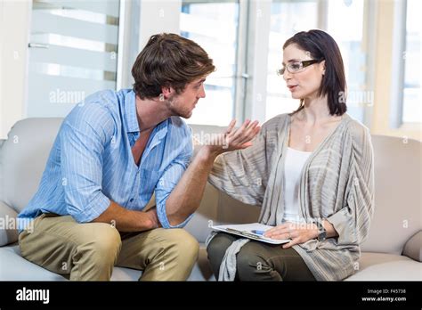Psychologist Comforting A Depressed Patient Stock Photo Alamy