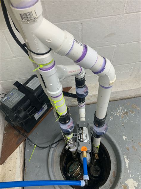 Backup Sump Pump Installation To Protect A Basement Floor With A High