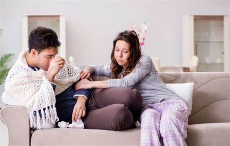 Wife Caring For Sick Husband At Home Stock Image Colourbox
