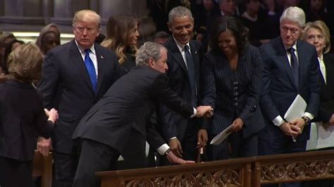 george w bush sneaks michelle obama candy before father s funeral — moovly video