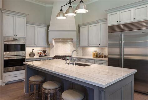 There are several factors to be considered when shopping for a stovetop kettle. Corner Stove and Kitchen Hood, Transitional, Kitchen