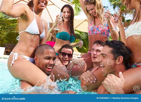 Group Of Friends Having Party In Pool Drinking Champagne Stock Image Image Of Male Outdoors