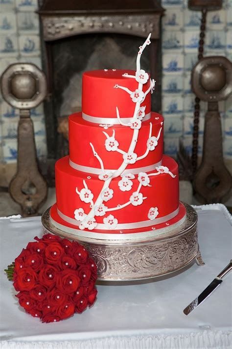 Vivid Red 3 Tier Wedding Cake With White Flowers Wedding Cakes London