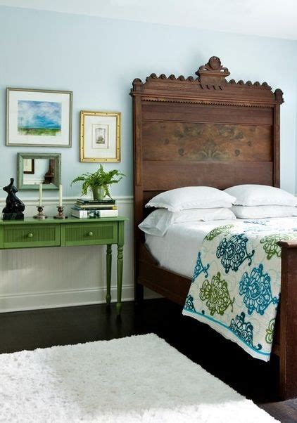 Photography by erica george dines, courtesy. Pale blue walls, rustic antique bed, kelly green bedside ...