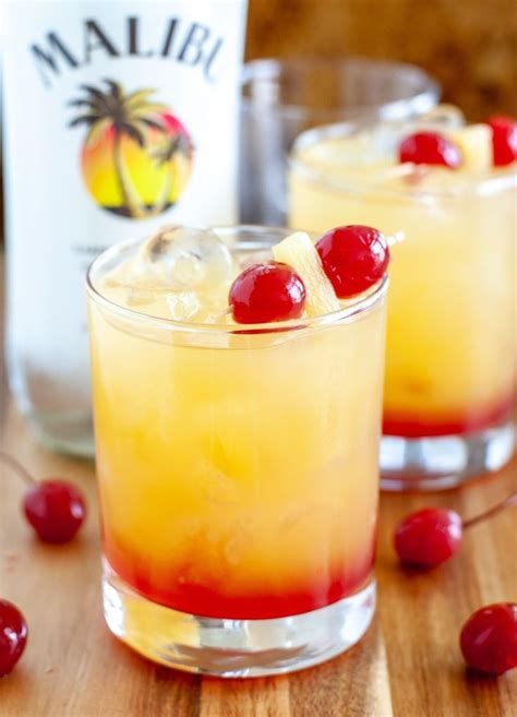 Malibu is essentially water, hfcs, caribbean rum and natural coconut flavour. Malibu Sunset | Rum drinks recipes, Fruity summer drinks, Fruity alcohol drinks