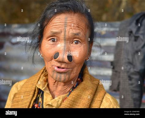 Elderly Northeast Indian Apatani Ethnic Minority Tribal Woman With Black Wooden Nose Plugs And