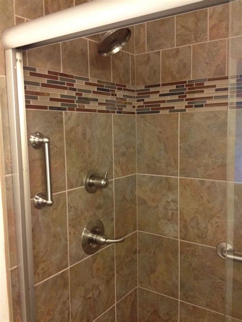 The decorative tile pieces, though, nicely coordinate with the grout lines. 14 best images about Shower Wall Tile Patterns on ...