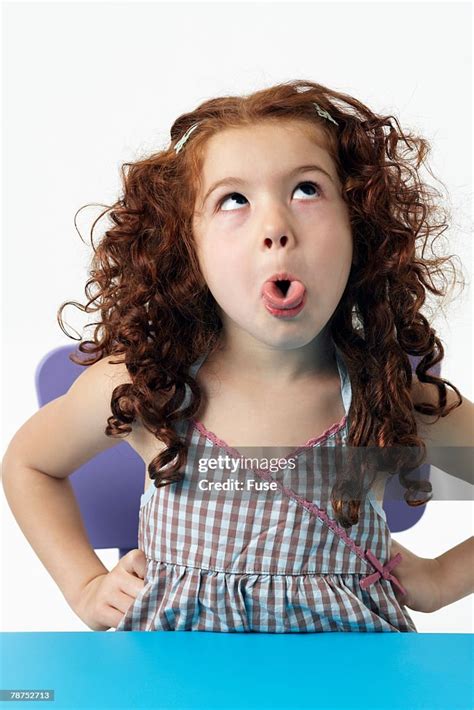 Girl Making Funny Faces High Res Stock Photo Getty Images