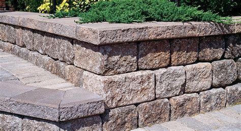 These retaining wall blocks, sold at stone yards and home centers, have a rough face for a quarried look and come in a variety of gray, tan, and red hues. precast concrete retaining wall blocks 33 with precast concrete within precast concrete ...