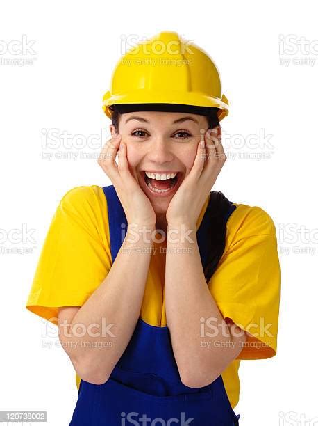 Construction Girl Holding Her Face In Astonishment Stock Photo