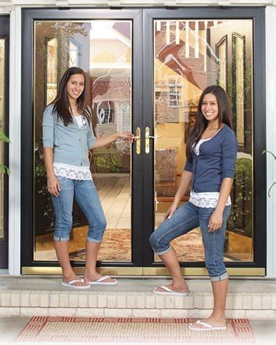 Larson storm and screen doors larson builds craftsmanship into every detail of their doors. Double Larson storm doors give the look of French doors ...