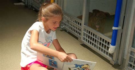 Kids Practice Reading To Shy Shelter Dogs