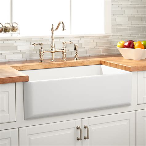 Farmhouse sinks—also known as apron front sinks—have become an increasingly popular sink option in recent years for both traditional and contemporary style kitchens. 33" Grigham Reversible Farmhouse Sink - White - Kitchen