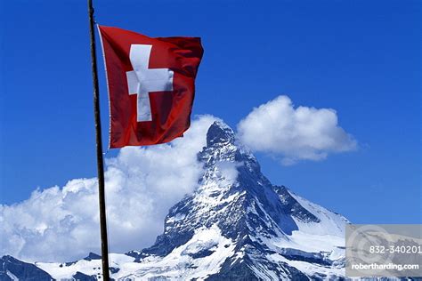 ✓ free for commercial use ✓ high quality images. Swiss flag in front of | Stock Photo