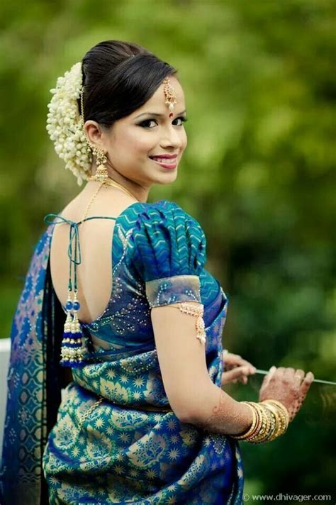 Look like a movie star at your wedding with this style of bridal hairstyles. Traditional Indian wedding hairstyles | Bridal blouse ...