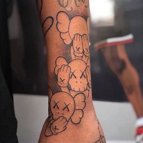 Kaws Tattoo Half Sleeve Tattoos For Guys Hand Tattoos For Guys