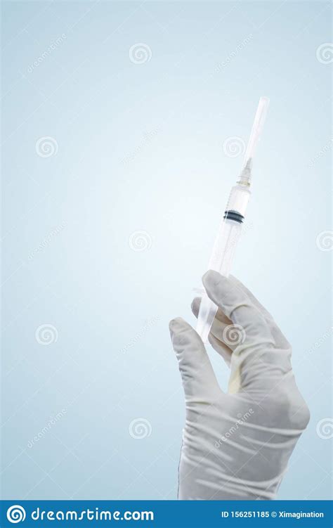 Female Doctor Hands Holding An Injection Needle Stock Image Image Of