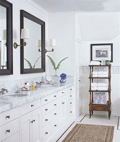 Master Bath British Colonial White Cabinet And Dark Mirror Natural