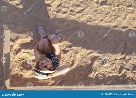 Portrait Of A Beautiful Tanned Girl On The Beach Woman Relaxing In