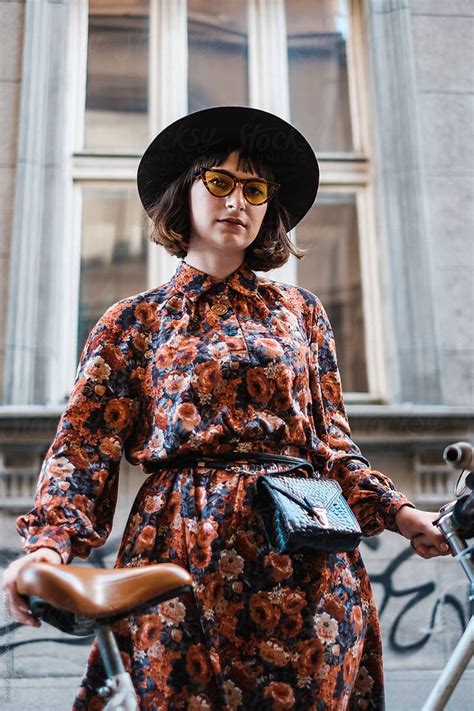 Stylish Woman With Bicycle On The Street By Stocksy Contributor