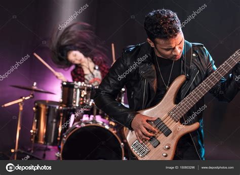 Rock Band On Stage — Stock Photo © Tarasmalyarevich 150803296