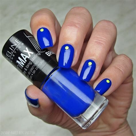 Electric Blue Nails With Neon Studs Nail Art By Sanela Nailpolis