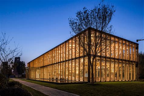 Glass Building In China Is Filled With Timber Pillars In The Shape Of Trees