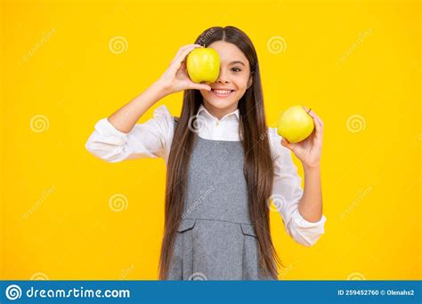Fresh Fruit Teenager Girl Hold Apples On Yellow Isolated Studio