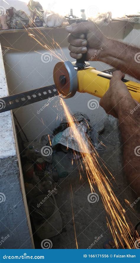 Worker Cutting Steel At A Construction Site Stock Photo Image Of