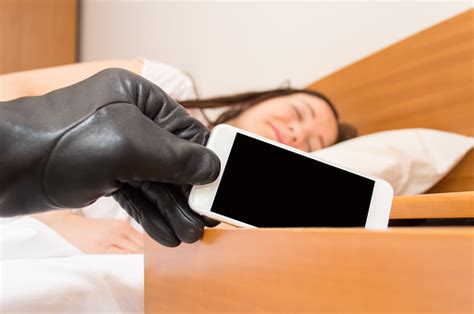 Theft Of Smartphone While Sleeping Stock Photo Download Image Now