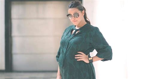 pregnant neha dhupia seen in a stylish look प्रेग्‍नेंट नेहा धूपिया