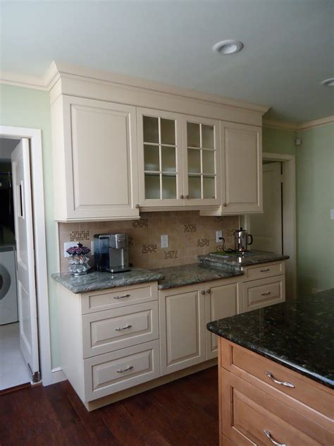 Bbb start with trust ®. Two-Toned Kitchen with White Cabinets and Stained Island ...