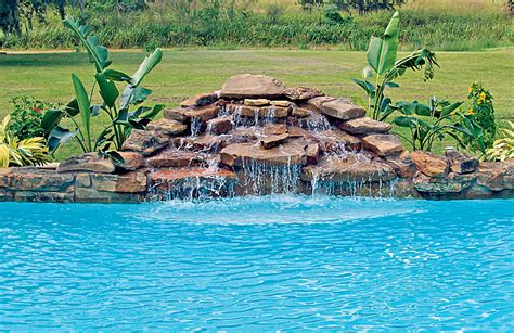 Building an inground pool could never be labeled as a small undertaking.while choosing to purchase an inground pool kit takes a lot of the hassle (and cost) out of the process, there are still quite a few questions you'll need to ask yourself when it comes to how or rather who is going to do the installation. Swimming Pool Rock Waterfall Pictures | Pool waterfall, Swimming pool waterfall, Backyard pool ...