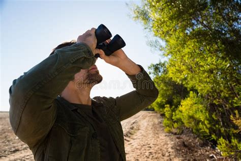 Man Looking Through Binocular On Field Stock Image Image Of Male