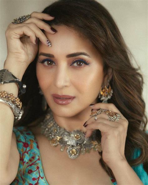 Madhuri Dixit Channels Her Happy Vibe In A Turquoise Pre Draped Saree