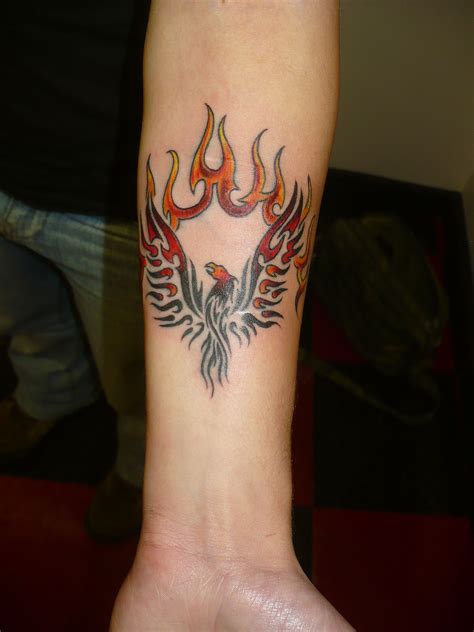 Rising From The Ashes Phoenix Tattoo On My Left Forearm Design