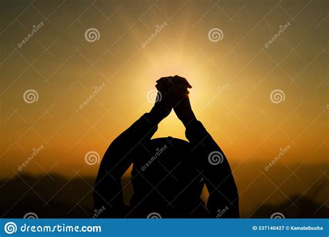 Man Praying Meditating In Harmony And Peace At Sunset Religion